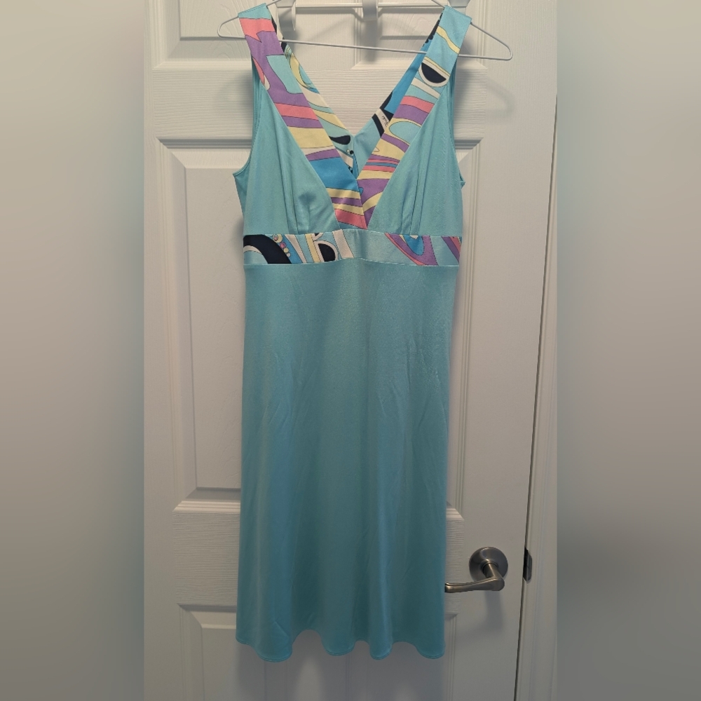 Stylish Blue Sleeveless Dress with Patterned Accent